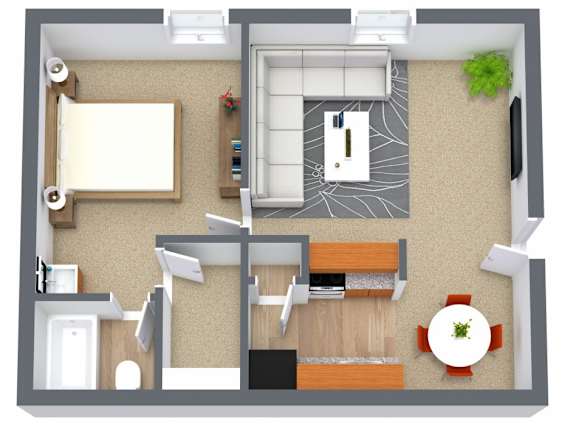 a floor plan of a room with a desk and a chair