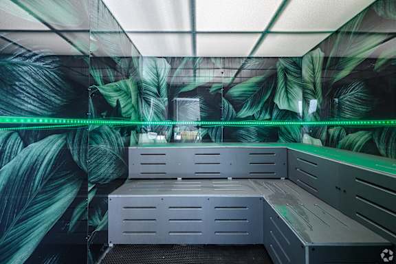 A Sauna With a Green Light Strip at Hue Soul Apartments, East Orange, NJ