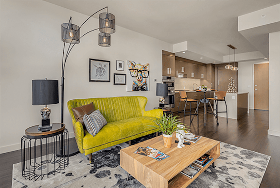 Sofa yellow colour at Two Lincoln Tower Apartments, Bellevue, Washington