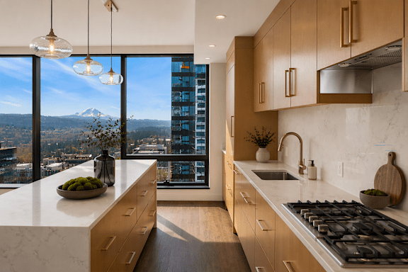 A modern kitchen with a view of a mountain.
