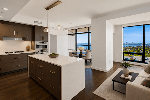 A modern kitchen with a view of the city.