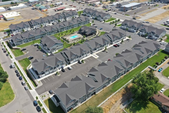 a row of houses with gray roofs