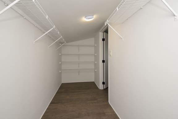 a walk in closet at Marshall Place Apartments in Cleveland, Ohio