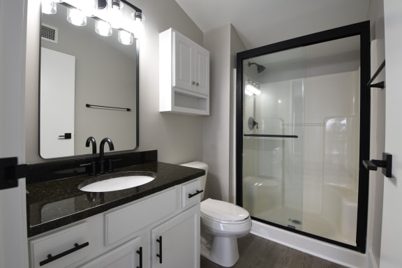 a bathroom with granite counter tops at Marshall Place, Cleveland