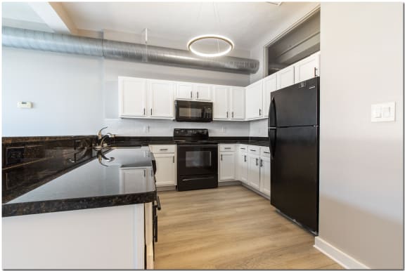 a kitchen with granite countertops at Marshall Place, Cleveland