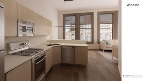 a kitchen with a stove top oven next to a window