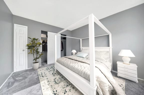 Floor Plan  a bedroom with grey walls and a white four poster bed