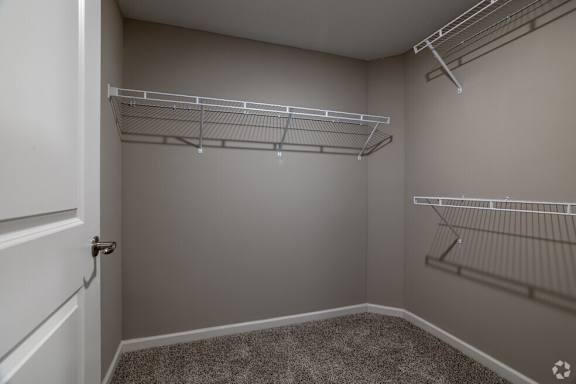 A walk-in closet at The Residences at Akita Lane, Canal Winchester, OH 43110