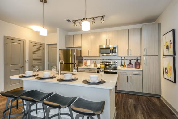 Chef-Style Kitchens with Quartz or Granite Countertops at Aurora Luxury Apartments in Downtown Tampa FL