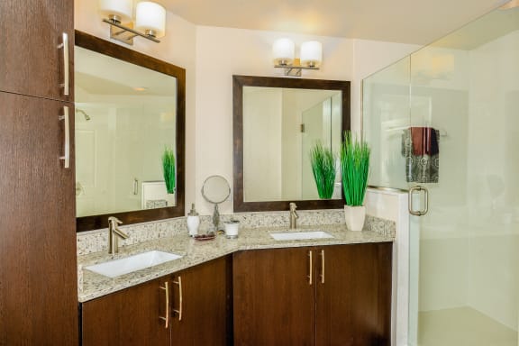 Dual Vanities with Granite Counters in Select Master Suites at Palm Ranch Luxury Apartments in Davie, FL