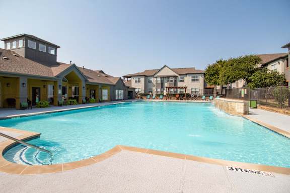 Pool With Sundecks at Flats on Chapel Apartments, Waco