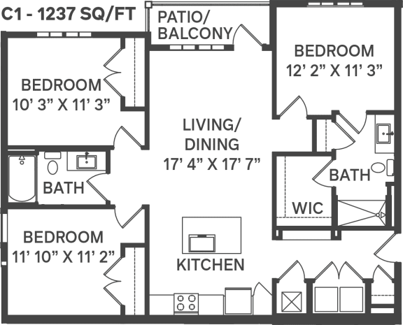 a three bedroom floor plan with a living/dining room