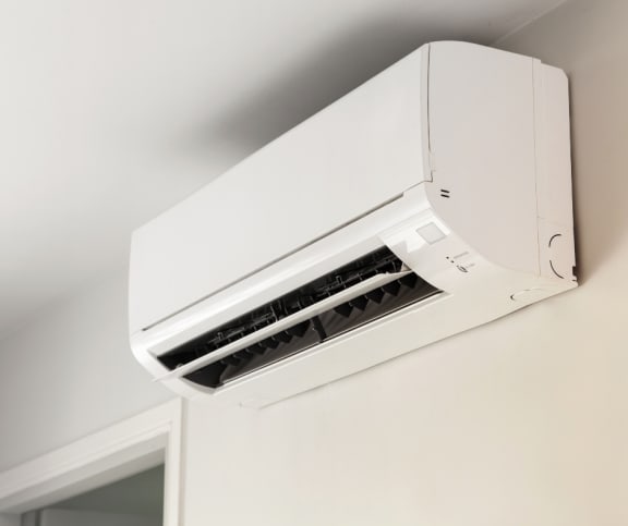 an air conditioner installed on a ceiling in a home at Vibe Apartments at Arbour Lake in Calgary, AB, T3G 4J2
