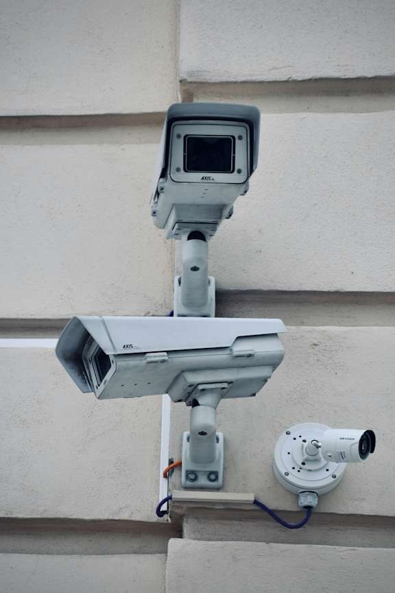 A security camera system is mounted on a building.