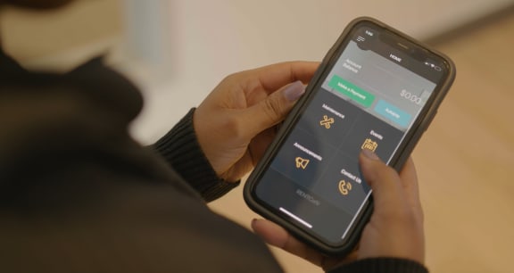 a person holding a cell phone with the settings screen on it