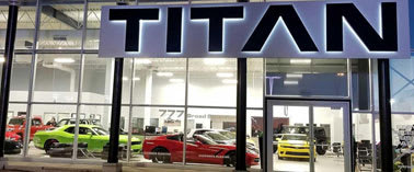A car dealership with the name Titan on the front.