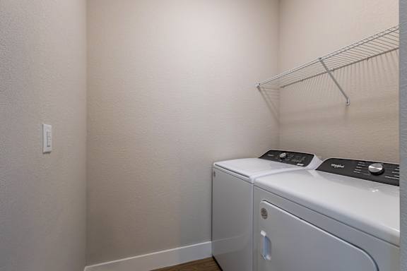 Small laundry room at The Falls of Portofino , Naples, Florida