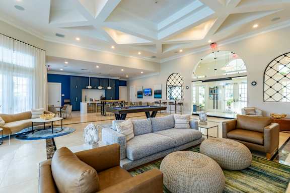 Well lit living room at The Falls of Portofino , Naples