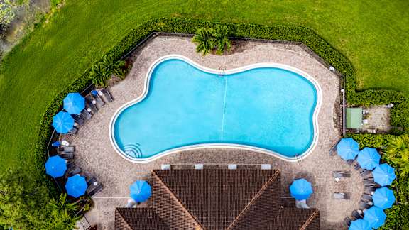 Large blue swimming pool at The Falls of Portofino , Naples, FL