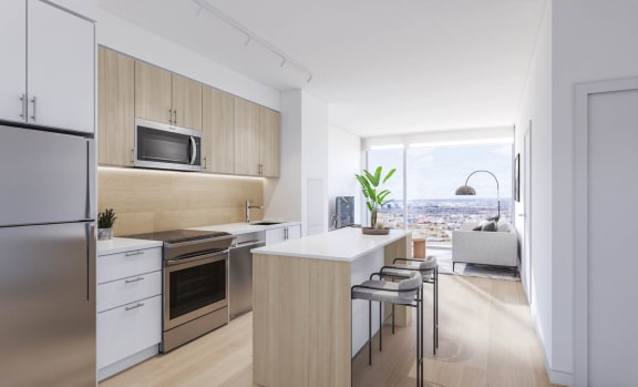 a kitchen and living room in a 555 waverly unit