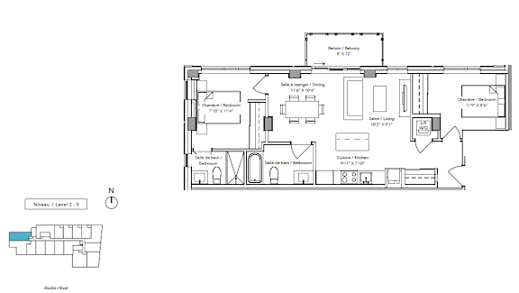 A floor plan of a residential building with a kitchen, living room, and two bedrooms.