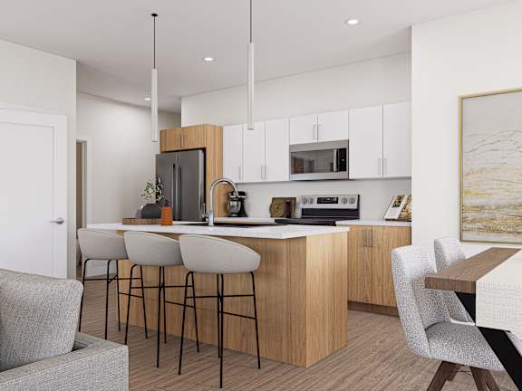 A modern kitchen with wooden cabinets and a bar area.