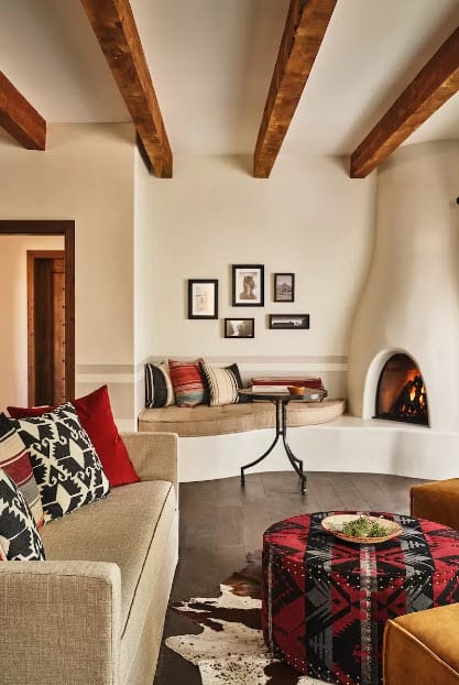 a living room with a couch and a fireplace