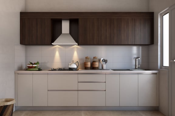 a kitchen with white cabinets and a large window