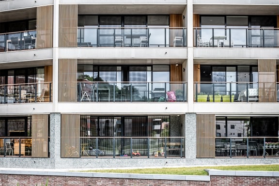 a view of the facade of an apartment building