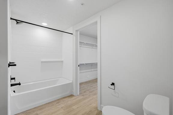 Bathroom with attached walk-in closet at Brickside Heights, Millcreek, Utah