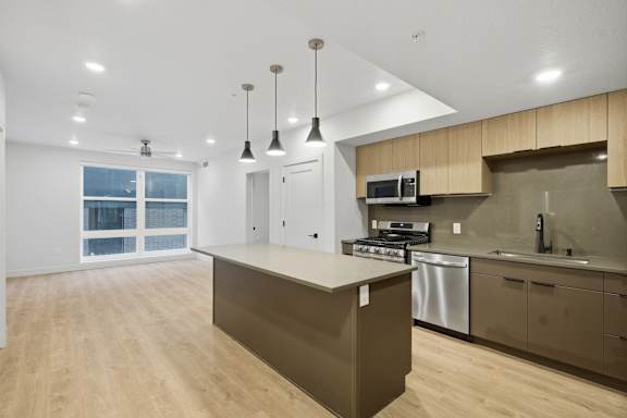 Bright Kitchen with Island at Brickside Heights, Utah, 84106