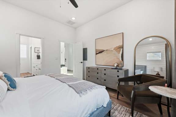 Bedroom with a large bed and a dresser at Alante Homes at Spring Run, Caldwell, 83607