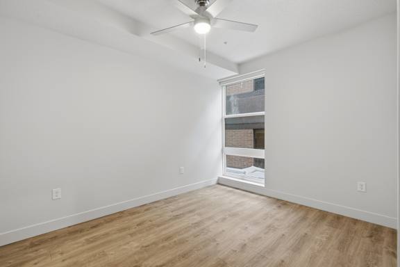 Window in the corner of the room at Brickside Heights, Millcreek