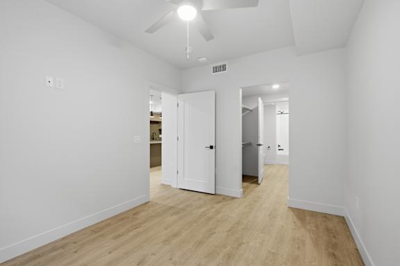 Room with attached bathroom and closet at Brickside Heights, Millcreek