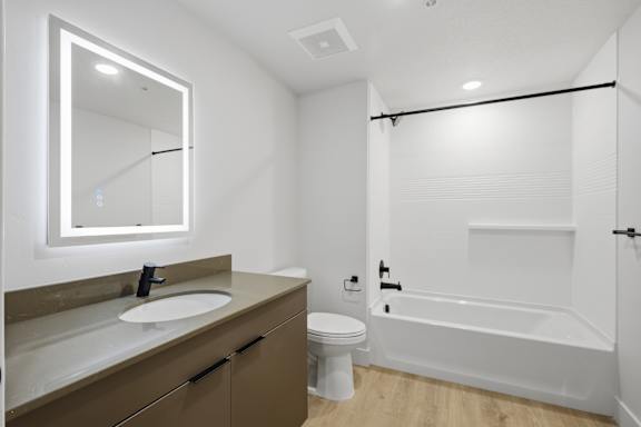 Bathroom with shower and tub at Brickside Heights, Millcreek