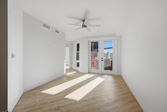 Room with natural light and ceiling fan at Brickside Heights, Millcreek, UT