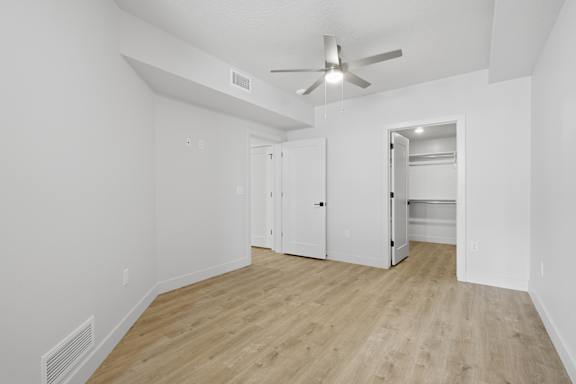 Room with white closet at Brickside Heights, Millcreek, UT