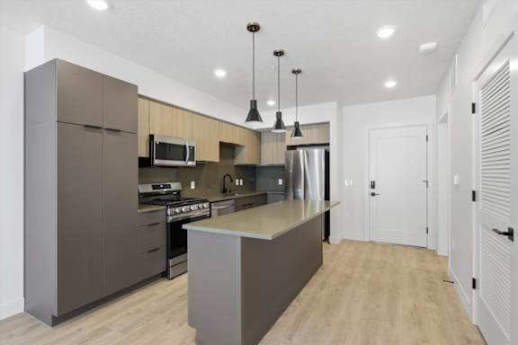 Fully equipped kitchen with appliances1 at Brickside Heights, Millcreek