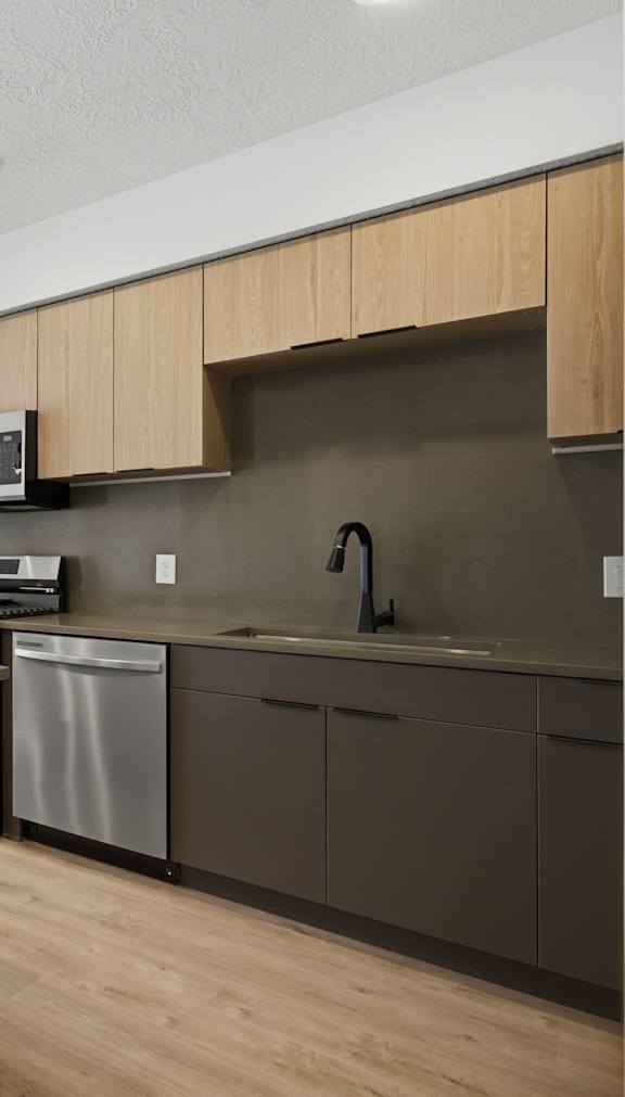 Kitchen with stove top oven1 at Brickside Heights, Millcreek