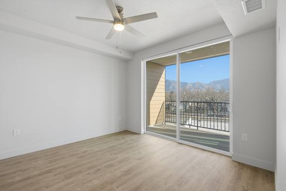Room with fan and lighting setup at Brickside Heights, Utah, 84106