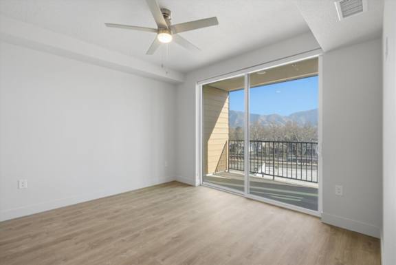 Room with attached balcony1 at Brickside Heights, Millcreek