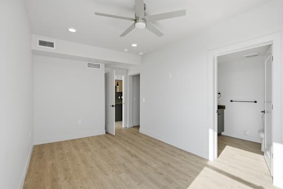 Room with ceiling fan and lighting fixtures at Brickside Heights, Millcreek, UT, 84106