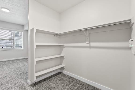 Closet with built-in shelve at The Flats at Riverwoods, Provo, Utah