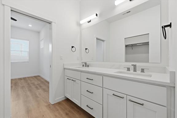 Modern bathroom with storage at Alante Homes at Spring Run, Caldwell, 83607