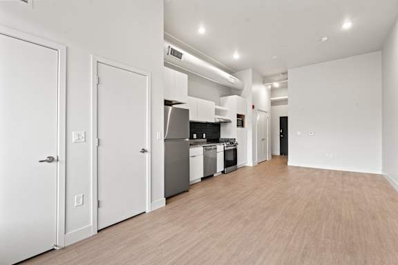 Kitchen with white appliances at Brickside Heights, Utah, 84106