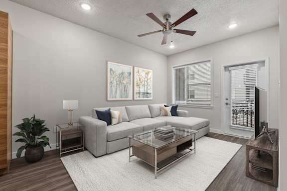 Living room with coffee table at The Flats at Riverwoods, Provo, Utah