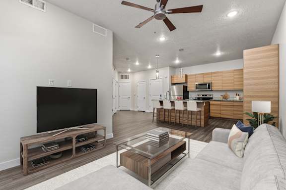 Living room come kitchen view at The Flats at Riverwoods, Provo, UT, 84604
