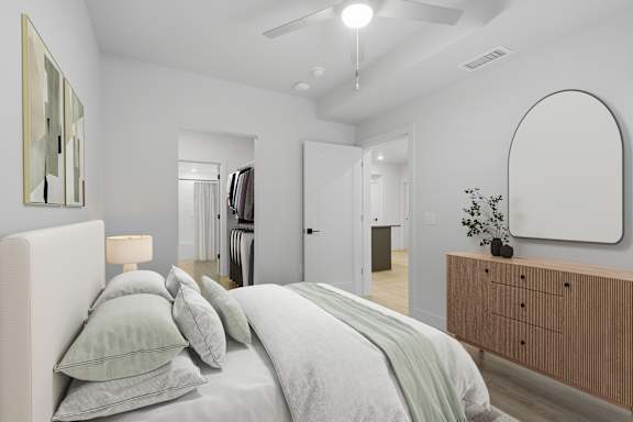 Bedroom with ceiling fan and natural lighting at Brickside Heights, Millcreek, 84106
