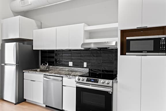 Modern Kitchen with white cabinets at Brickside Heights, Millcreek, Utah