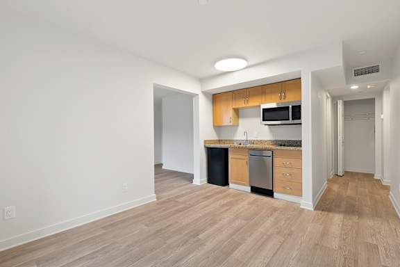 Kitchen with cabinets and modern appliances1 at AVIA on Pike Street, Seattle, WA, 98101